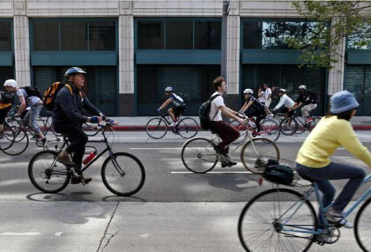 Cyclists take advantage of car-less streets at a CicLAvia event in 2011.
