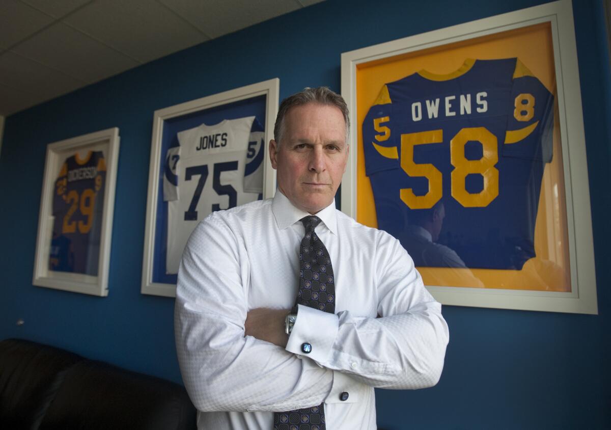 Former L.A. Rams linebacker Mel Owens poses for a photo at his Laguna Hills law office on Feb. 15, 2013.