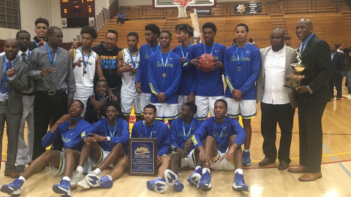 Crenshaw players gather after winning the school's 18th City Section basketball championship.