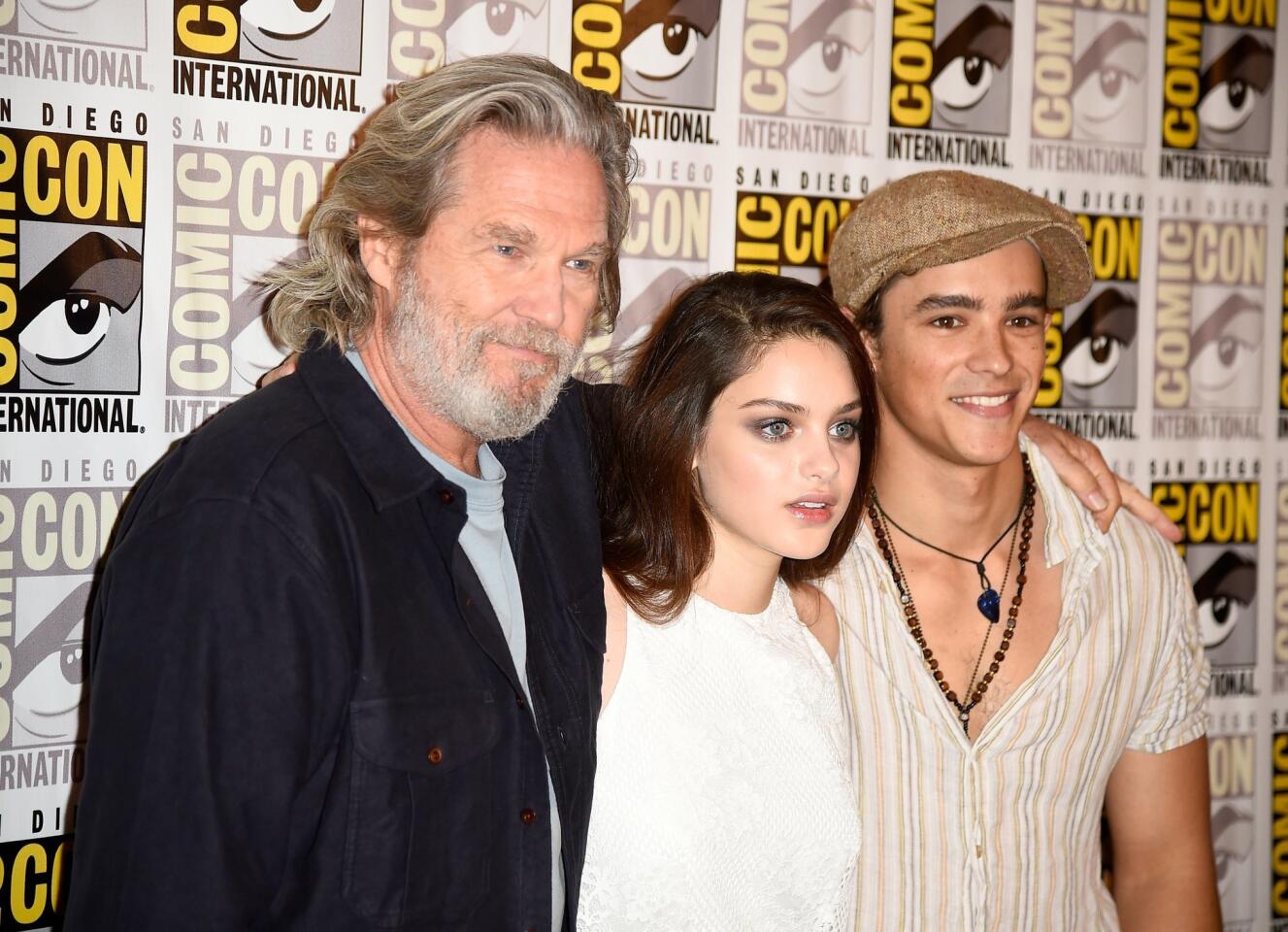 (L-R) Actors Jeff Bridges, Odeya Rush and Brenton Thwaites attends the "The Giver" Press Line during Comic-Con International 2014 at Hilton Bayfront on July 24, 2014 in San Diego, California.