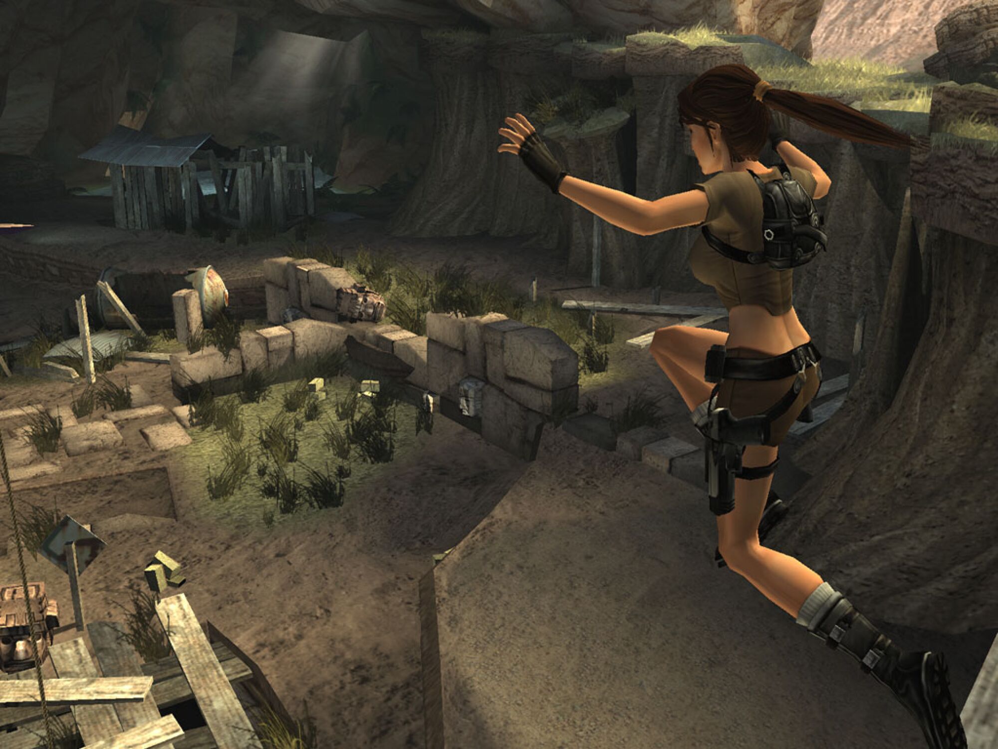A screenshot shows a computer-generated woman in mid-jump in a cavern-like setting