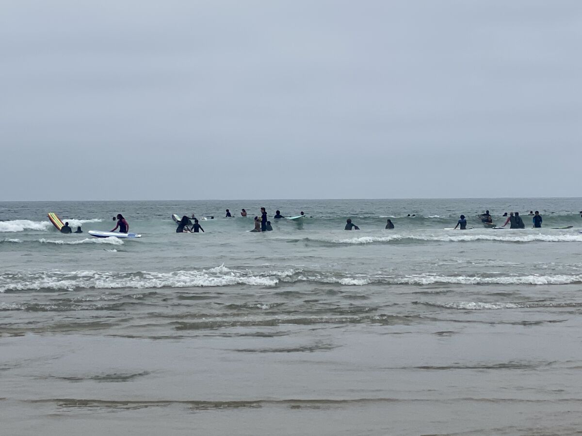 The International Surf Day/Juneteenth celebration included a yoga class, beach cleanup, surf lesson and zero-waste barbecue.