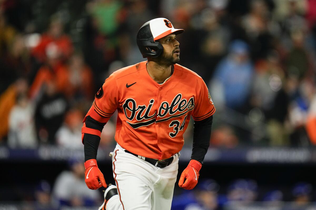 Baltimore Orioles' Aaron Hicks watches his three-run home run against the Texas Rangers on Oct. 8, 2023.