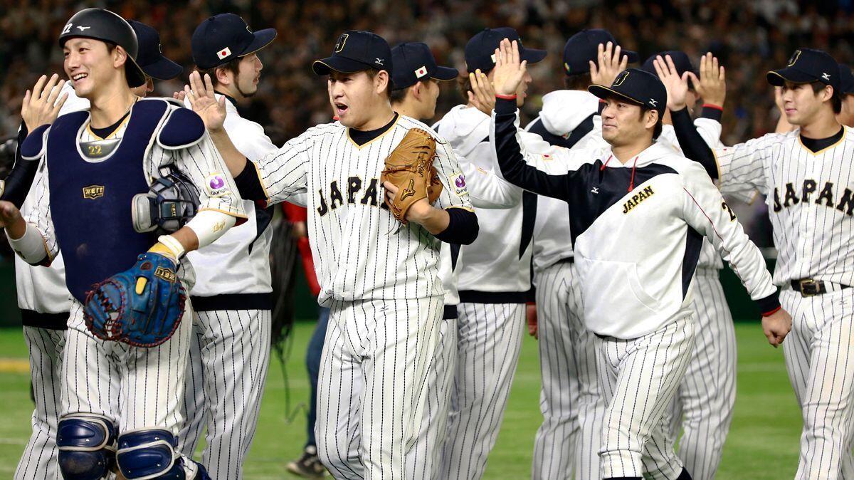 Japanese players, celebrating after beating Israel in a WBC second-round game March 15 at Tokyo, bring a sense of urgency to the tournament's semifinals in Los Angeles.