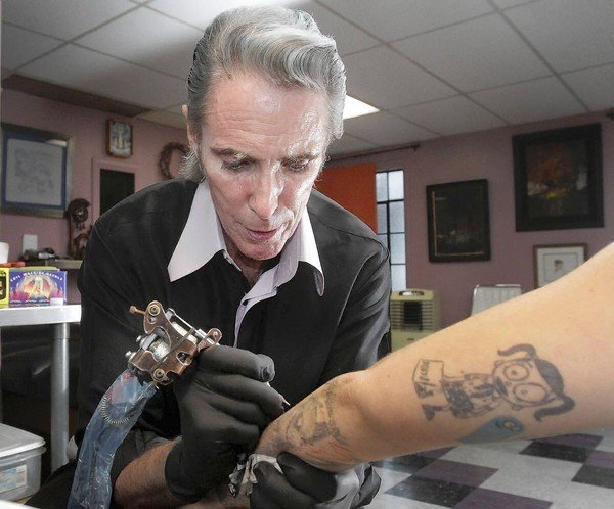 Mark Mahoney, celebrity tattooer in his studio in West Hollywood