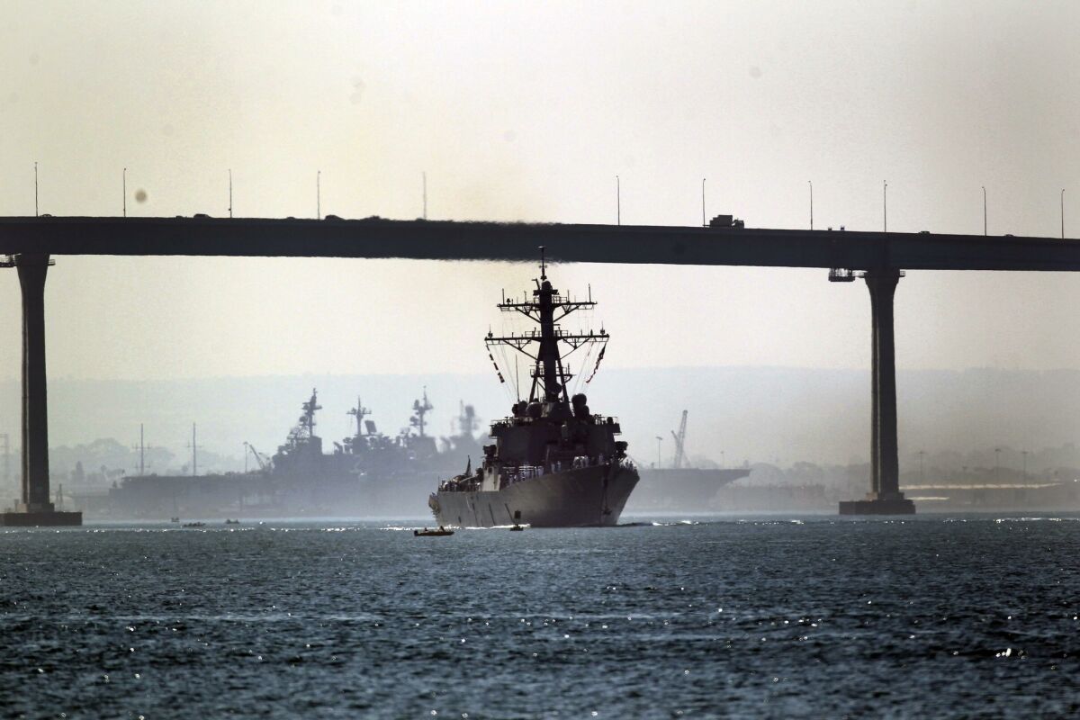The Decatur passed under the Coronado bridge on her way out to sea.