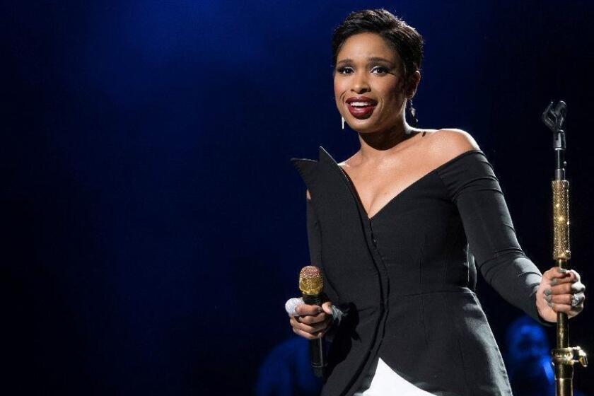 FILE - In this April 19, 2017 file photo, Jennifer Hudson performs at the world premiere of "Clive Davis: The Soundtrack of Our Lives" at Radio City Music Hall, during the 2017 Tribeca Film Festival, in New York. In the wake of multiple allegations against R. Kelly, some performers are denouncing songs the R&B hitmaker created for them. Hudson removed two songs R. Kelly wrote for her from YouTube and Apple Music: the Grammy-nominated and "It's Your World" and "Where You At," a Top 10 R&B hit. (Photo by Charles Sykes/Invision/AP, file)
