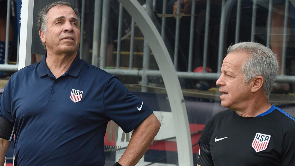 Dave Sarachan, right, coaches the U.S. men's soccer team with Bruce Arena in July.
