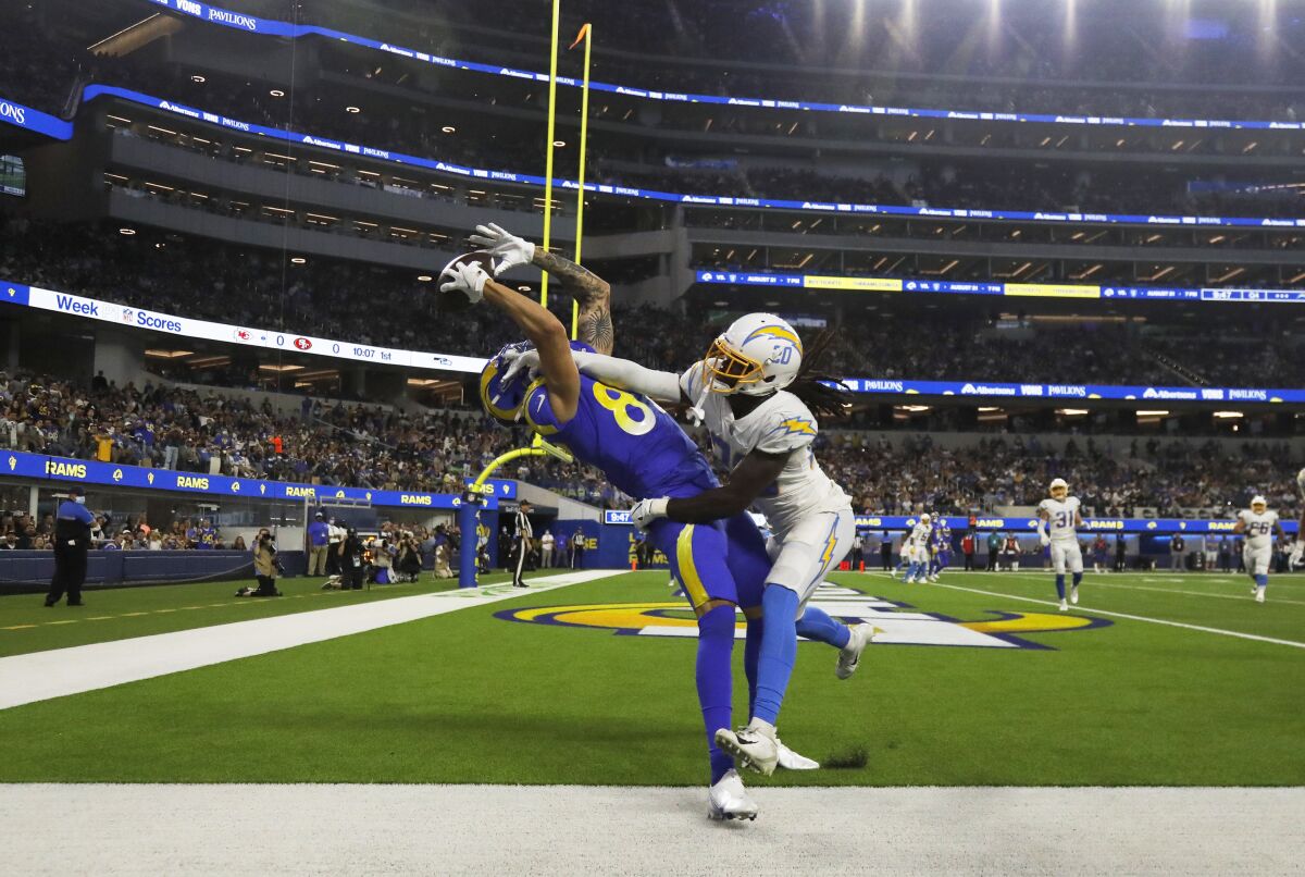 Rams tight end Jacob Harris can't make the catch in the end zone with Chargers defensive back Tevaughn Campbell defending.