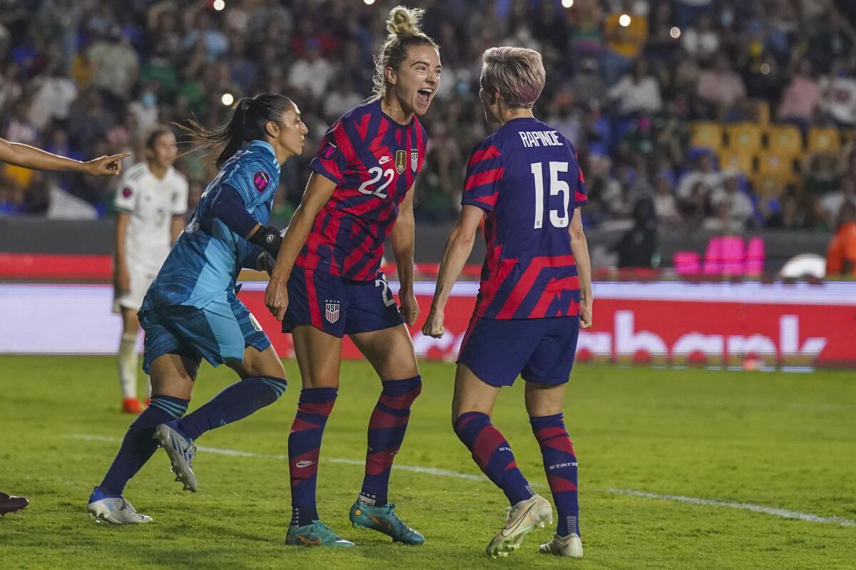 United States' Kristie Mewis (22) celebrates scoring her side's opening goal against Mexico during a CONCACAF Women's Championship soccer match in Monterrey, Mexico, Monday, July 11, 2022. (AP Photo/Fernando Llano)