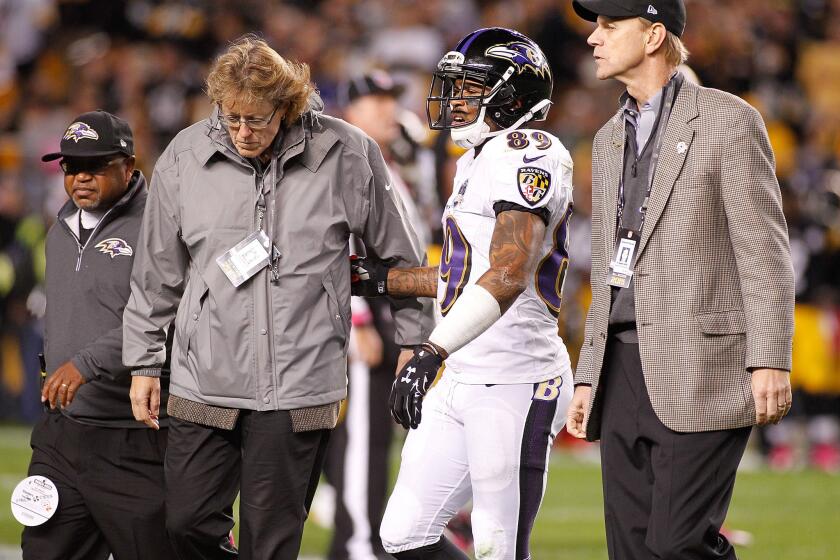 Baltimore receiver Steve Smith walks off of the field during the third quarter against Pittsburgh on Thursday night.