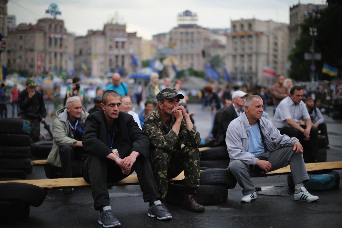 Protesters continue to occupy Independence Square in Kiev ahead of the Ukrainian Presidential election Sunday.