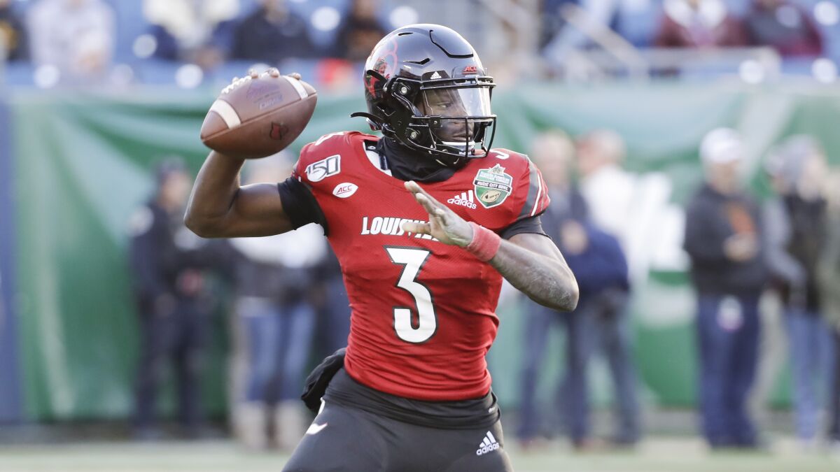 FILE - Louisville quarterback Micale Cunningham (3) plays against Mississippi State in the Music City Bowl NCAA college football game Monday, Dec. 30, 2019, in Nashville, Tenn. Last August, Micale Cunningham was recovering from a preseason knee injury that put him behind Jawon Pass on the depth chart. He returned to replace an injured Pass at midseason and didn't look back, passing for 2,065 yards and 22 TDs in 11 starts. (AP Photo/Mark Humphrey, File)