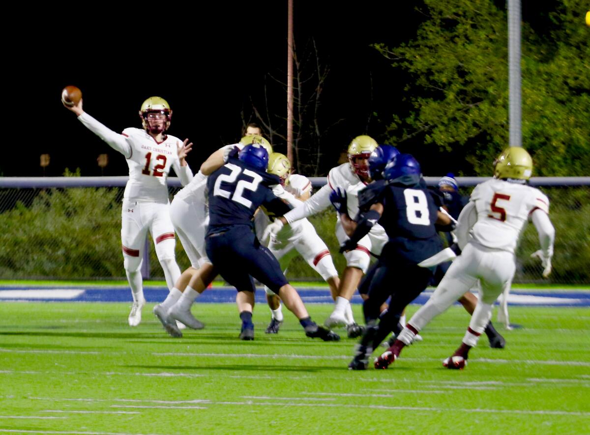 Oaks Christian quarterback Cole Tannenbaum throws a pass against Sierra Canyon Friday night in Chatsworth.