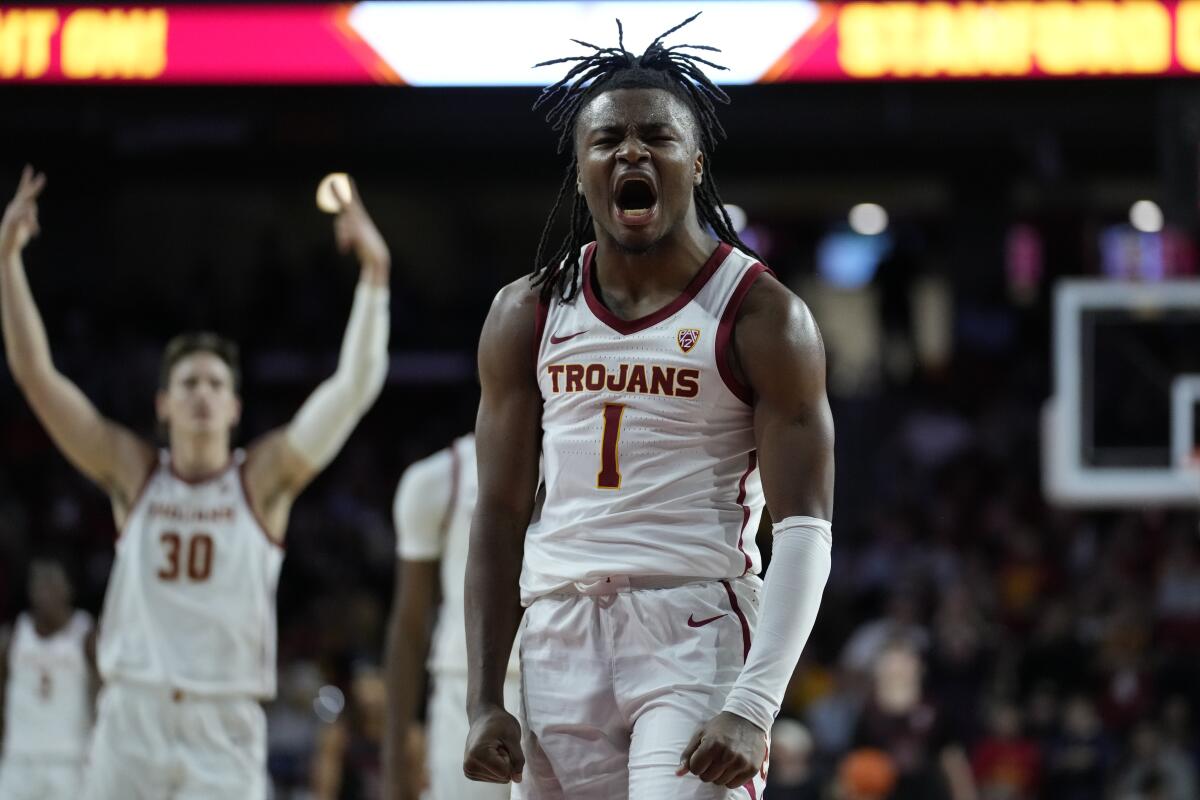 USC guard Isaiah Collier celebrates after making a three-pointer against Stanford.
