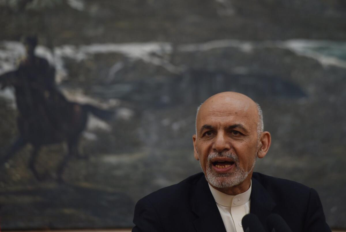 Afghan President Ashraf Ghani speaks during a news conference at the presidential palace in Kabul on Monday. Nineteen of 31 Shiite Muslims abducted in Afghanistan were released during the day.