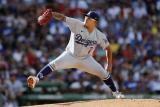 Los Angeles Dodgers starting pitcher Julio Urias pitches during the first inning.