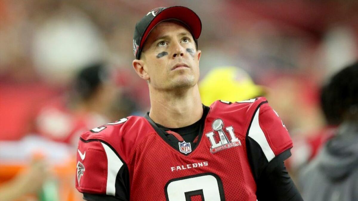 Falcons quarterback Matt Ryan looks at the scoreboard during the first half of Atlanta's 34-28 overtime loss to the Patriots in Super Bowl LI in Houston on Feb. 5.