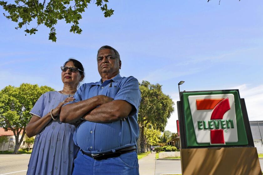 Saroj Patel, left, and her husband, Dilip, allege 7-Eleven used “storm trooper interrogation and isolation tactics” to strip them of the Riverside store that they had run since 1995.