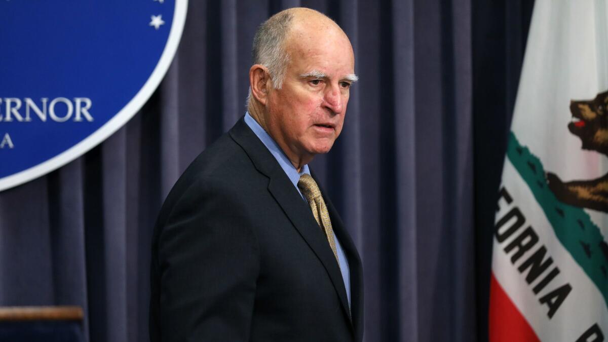 Gov. Jerry Brown, shown in Los Angeles in June, has extended a federally funded National Guard effort that will target transnational gangs, human traffickers and smugglers.