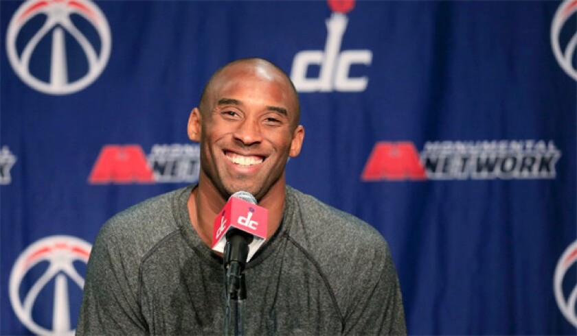 Kobe Bryant discussed his new two-year contract extension with the Lakers at a news conference Tuesday.