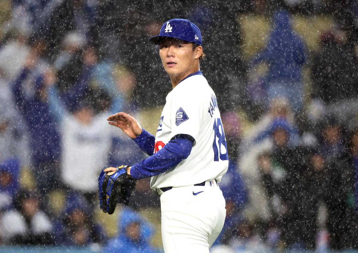 LOS ANGELES, CALIFORNIA - MARCH 30: Dodgers pitcher Yoshinobu Yamamoto against the Cardinals.