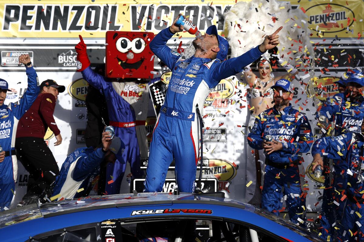 Kyle Larson celebrates after winning Sunday's NASCAR Cup race at Las Vegas Motor Speedway.