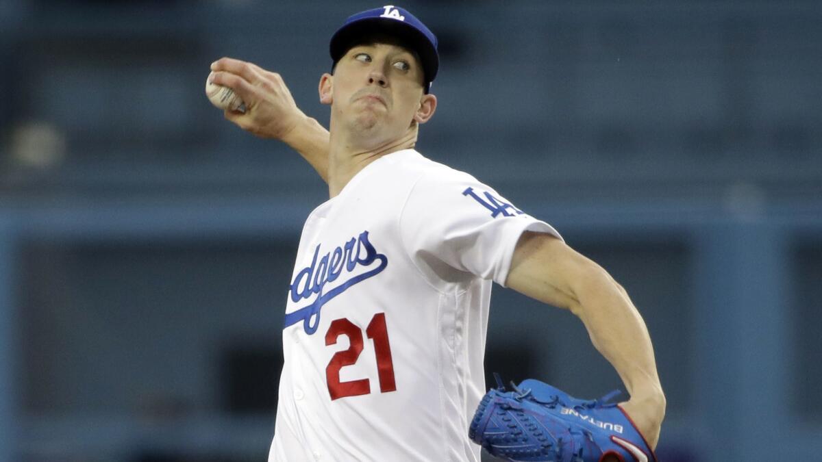 Dodgers starting pitcher Walker Buehler pitches to a Colorado Rockies batter in the first inning Friday at Dodger Stadium.