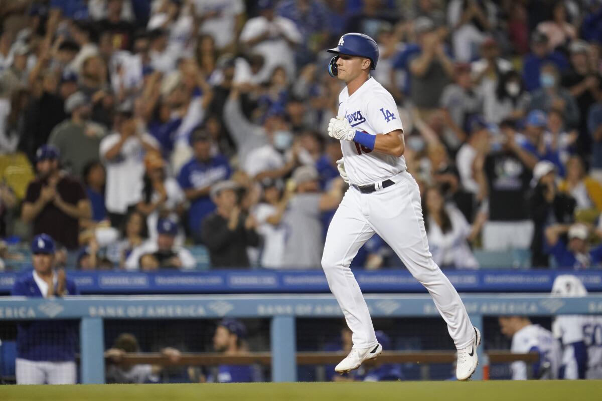 The Dodgers' Jake Lamb rounds the bases after hitting a home run during the seventh inning July 8, 2022. 