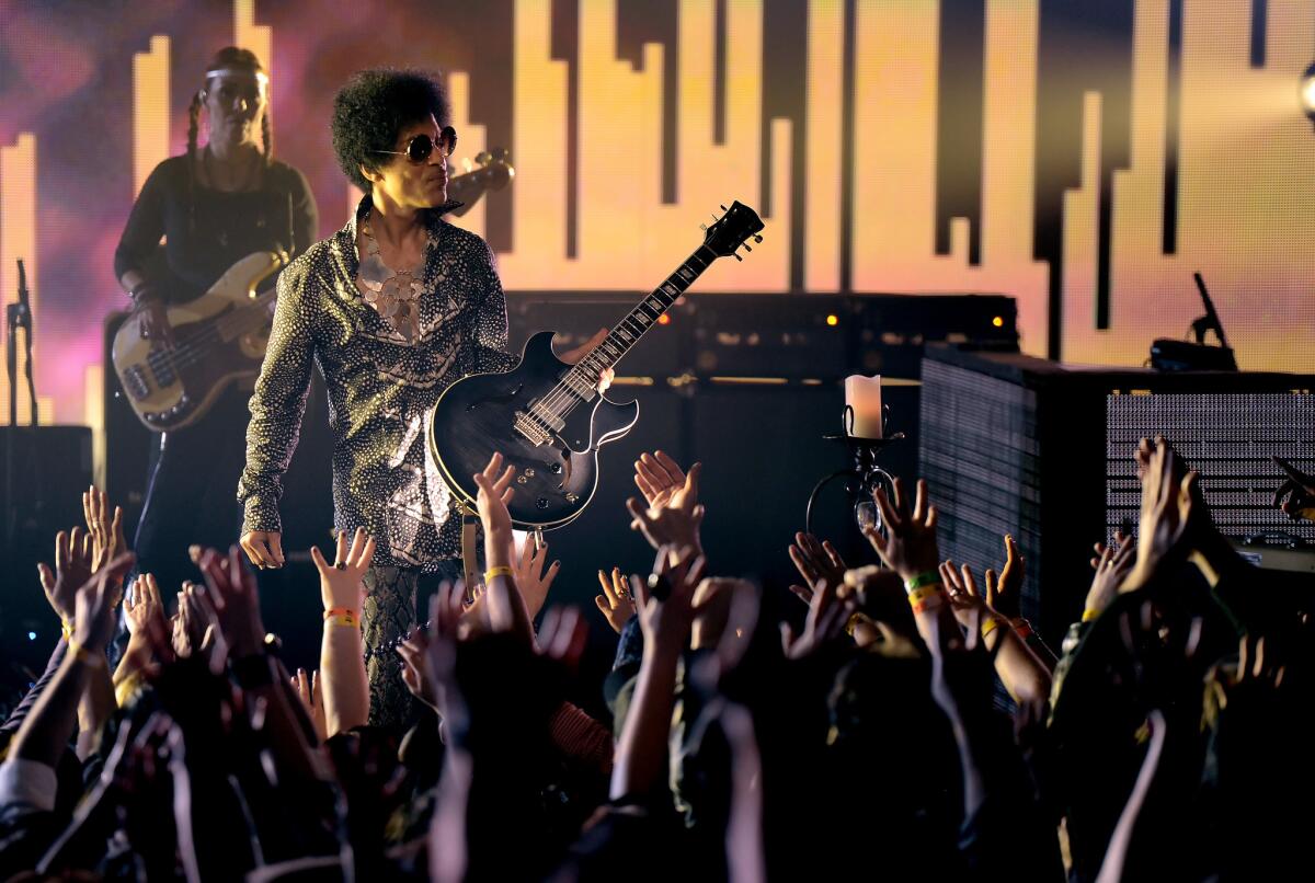 Prince and his band 3rd Eye Girl perform at the Vogue Theatre in Vancouver, Canada.