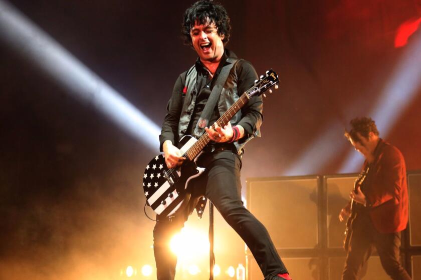 PASADENA, CA -- SEPTEMBER 16, 2017 -- An upbeat Billie Joe Armstrong performs with Green Day at the Rose Bowl on September 16, 2017. (Genaro Molina/Los Angeles Times)