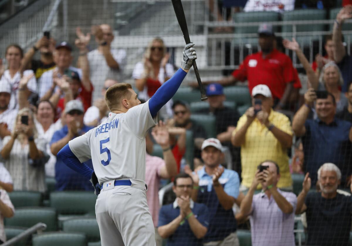 Freeman hits 1st HR for Dodgers vs Braves in reunion game