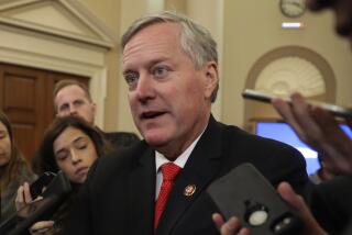 FILE - In this Nov. 13, 2019, file photo, Rep. Mark Meadows, R- N.C., speaks to reporters as the hearing with top U.S. diplomat in Ukraine William Taylor, and career Foreign Service officer George Kent, at the House Intelligence Committee ends on Capitol Hill in Washington. In a statement Thursday, Dec. 19, 2019, the North Carolina congressman and top ally to President Donald Trump says he struggled with the decision and came to it after discussion with his family.(AP Photo/Andrew Harnik, File)