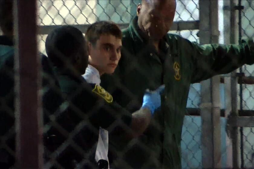This video screen grab image shows shooting suspect Nikolas Cruz on February 15, 2018 at Broward County Jail in Ft. Lauderdale, Florida. The heavily armed teenager who gunned down students and adults at a Florida high school was charged Thursday with 17 counts of premeditated murder, court documents showed. Nikolas Cruz, 19, killed fifteen people in a hail of gunfire at Marjory Stoneman Douglas High School in Parkland, Florida. Two others died of their wounds later in hospital, the sheriff's office said. / AFP PHOTO / AFP TV / Miguel GUTTIEREZMIGUEL GUTTIEREZ/AFP/Getty Images ** OUTS - ELSENT, FPG, CM - OUTS * NM, PH, VA if sourced by CT, LA or MoD **