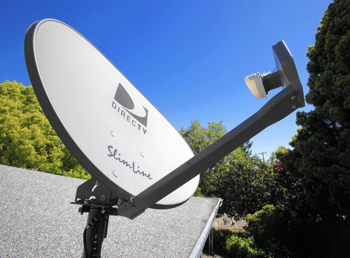 The FTC has accused DirecTV of deceptive advertising for not clearly disclosing that a discounted 12-month package required a two-year contract that included a big rate hike in the second year and a hefty early termination fee if the customer wants out. Above, a DirecTV dish at a Palo Alto home.