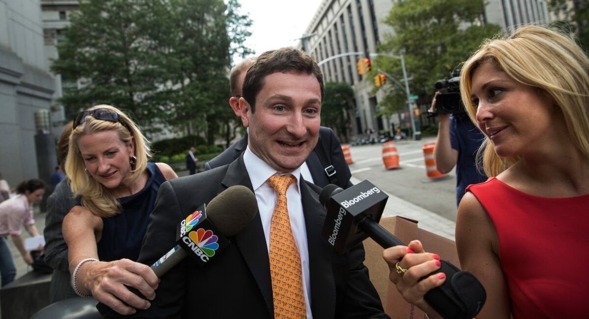 Fabrice Tourre, a former Goldman Sachs mortgage trader, leaves federal court after the first day of a lawsuit being brought against him by the Securities and Exchange Commission.