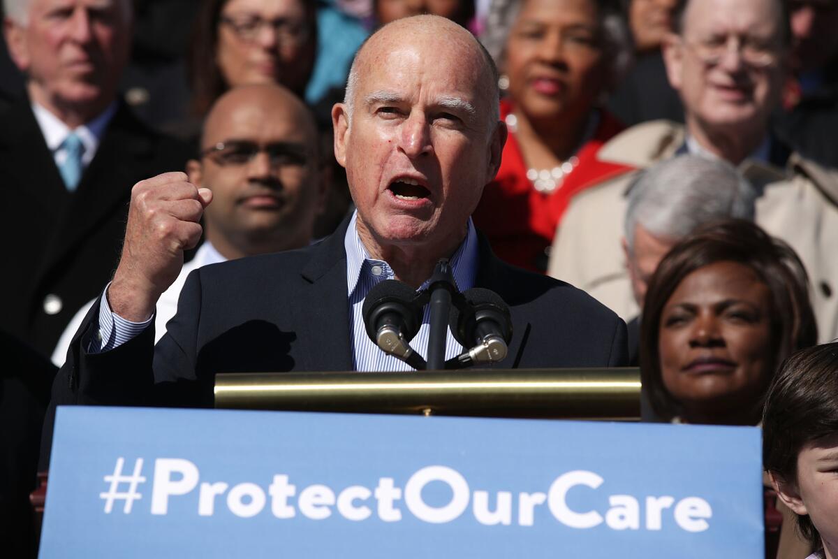 Gov. Jerry Brown speaks at a rally of congressional Democrats on Capitol Hill on Wednesday.