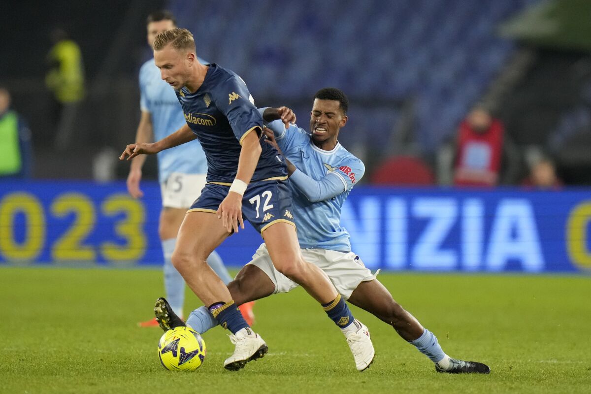Fiorentina's Antonin Barak, left, challenges for the ball with Lazio's Marcos Antonio during the Serie A soccer match between Lazio and Fiorentina at Rome's Olympic stadium, Sunday, Jan. 29, 2023. (AP Photo/Alessandra Tarantino)