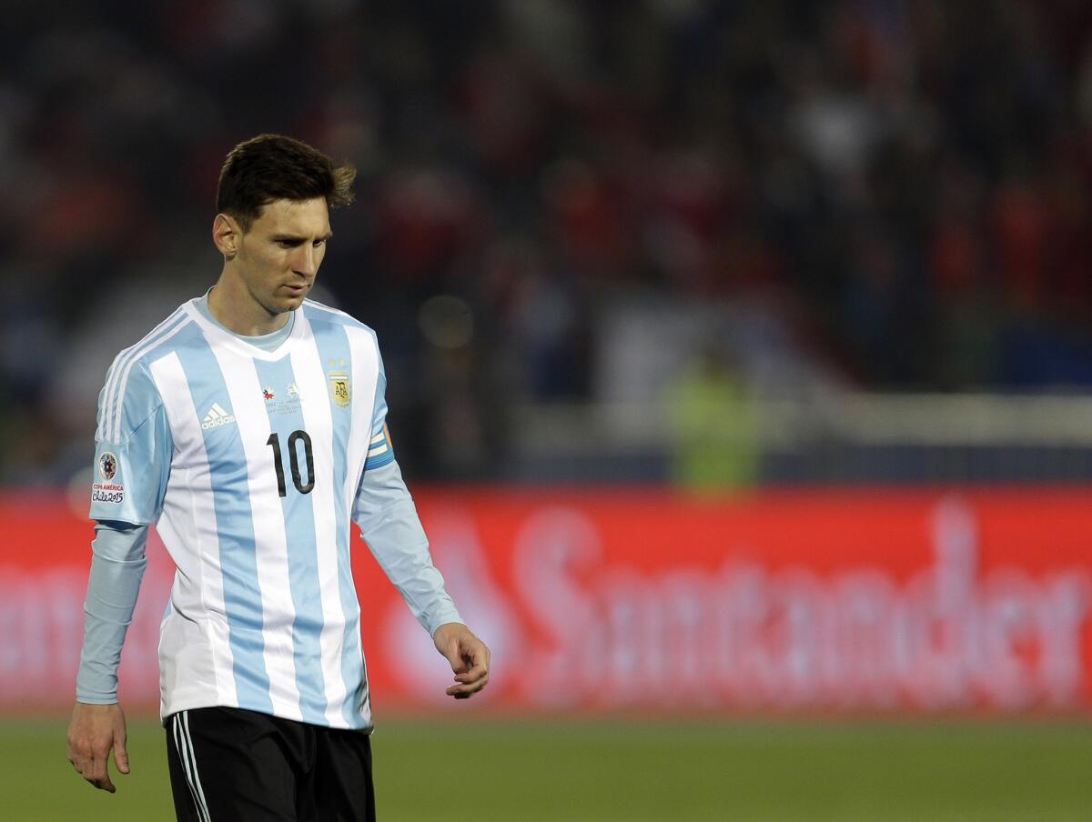 Argentina's Lionel Messi walks away from the Copa America final against Chile on July 4. Chile won in a penalty shootout.