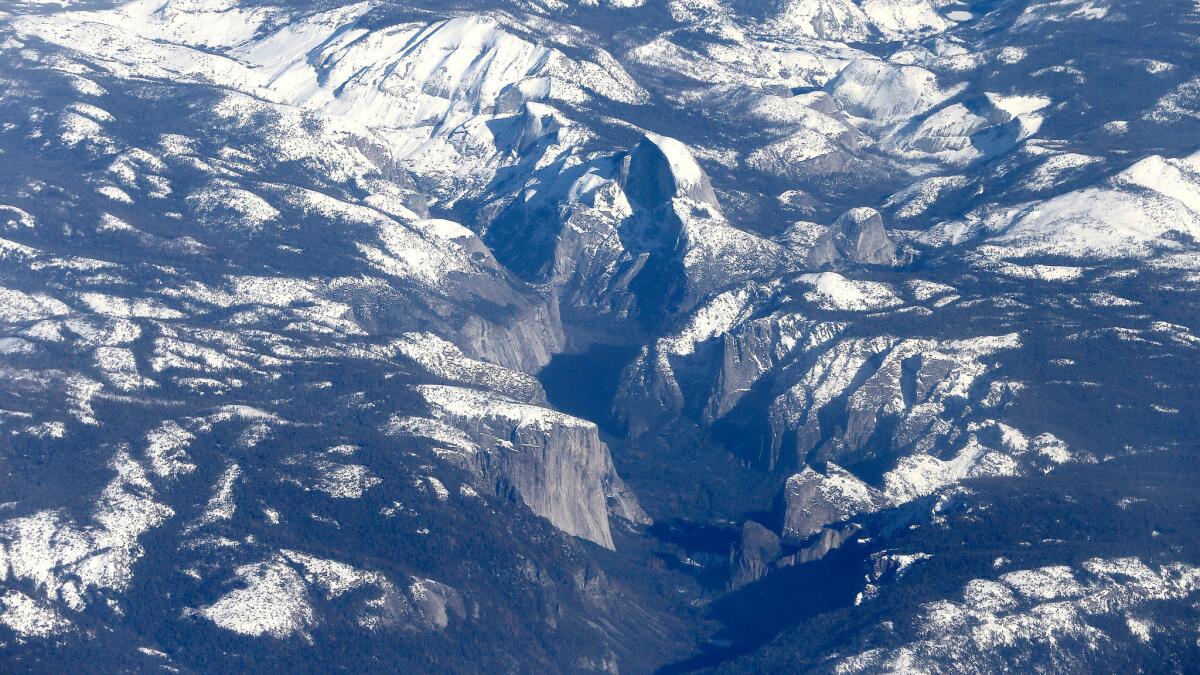 An aerial view of snowpack in the Sierra Nevada and Yosemite National Park in January.