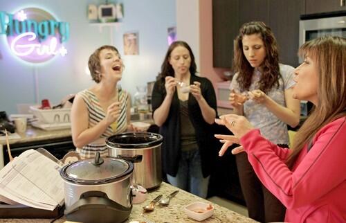 Lillien in the kitchen with members of the Hungry Girl team