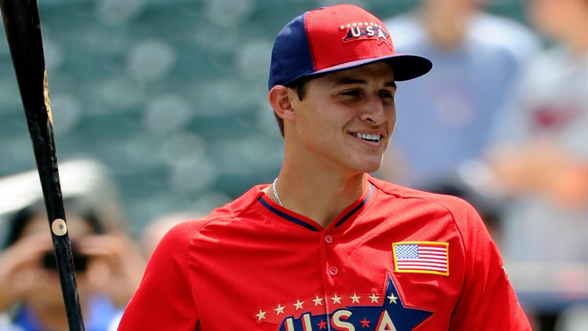 Dodgers prospect Corey Seager smiles during batting practice for the All-Star Futures Game in Minneapolis in July. Seager is considered one of the top prospects in the Dodgers' farm system.