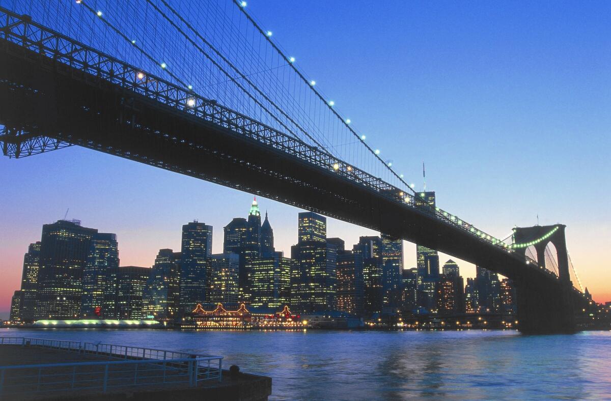 An undated 20th century photo of the Brooklyn Bridge on the East River and Lower Manhattan with the twin towers of the World Trade Center (later destroyed by the Sept. 11, 2001, terrorist attacks).