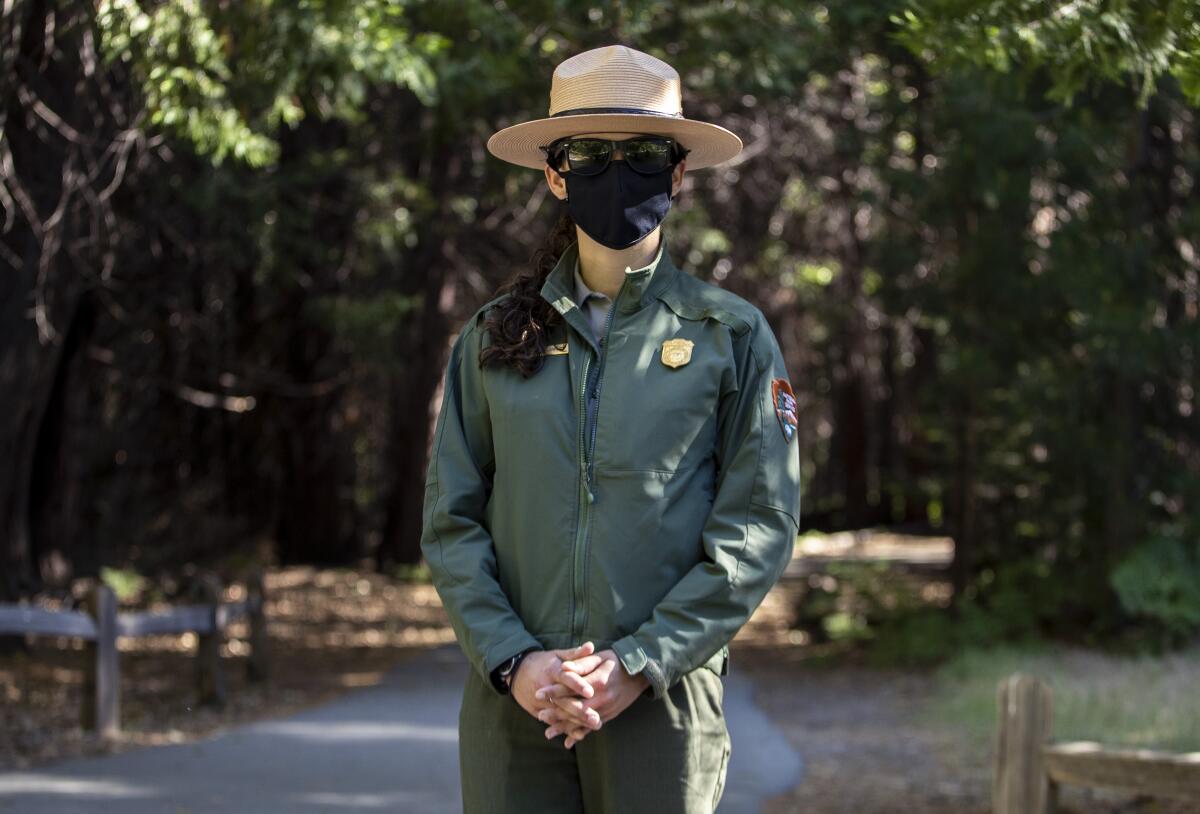 Park ranger Jamie Jirele wears a mask in Yosemite Valley.