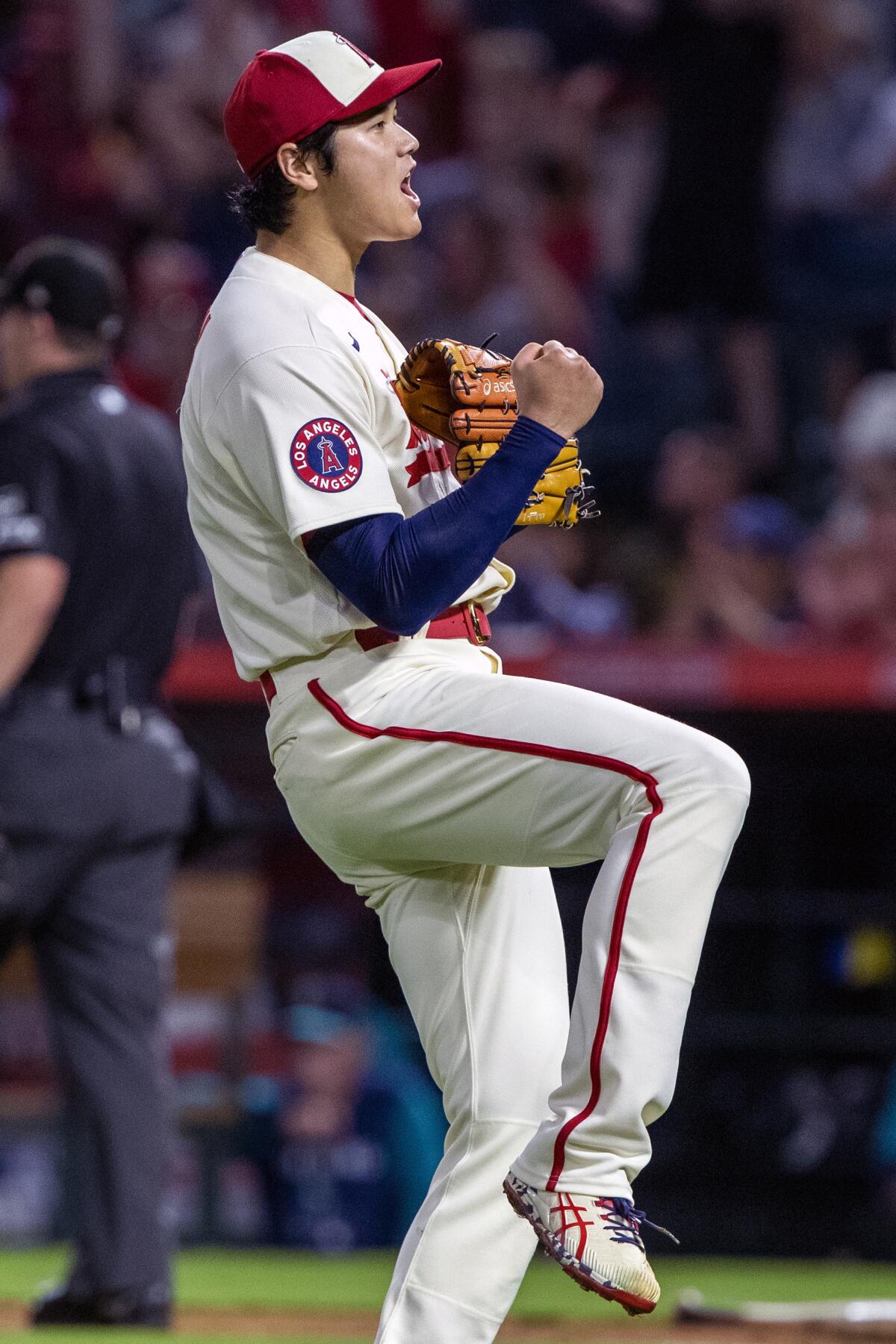 Los Angeles Angels designated hitter Shohei Ohtani smiles in the dugout  before a baseball game against the Seattle Mariners in Anaheim, Calif.,  Sunday, July 18, 2021. (AP Photo/Alex Gallardo Stock Photo - Alamy