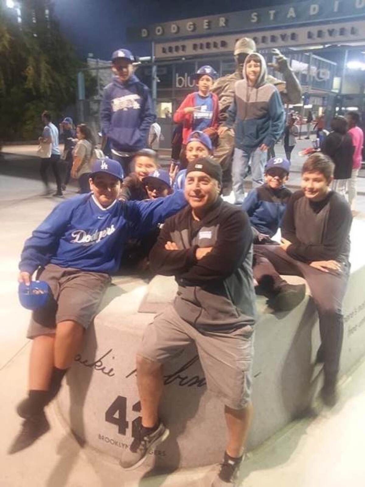 A group photo outside the gates of Dodger Stadium