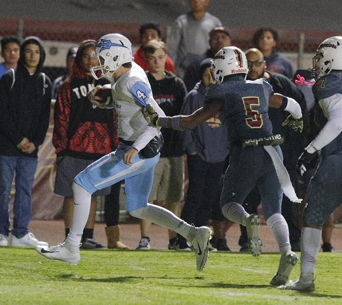 Ethan Garbers crosses the goal line for Corona del Mar's first touchdown against Alemany in a CIF Southern Section Division 3 semifinal game in Mission Hills on Friday.