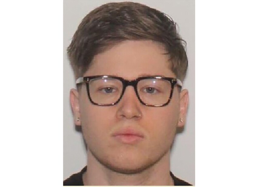 This photo provided by Fort Smith Police shows Zachary Arnold. Police in Fort Smith, Ark., located on the border with Oklahoma, say Arnold, 26, fatally shot Lois Hicks on Saturday, May 15, 2021, as he continued to shoot at neighboring apartments with a semi-automatic rifle. Another resident retrieved a hunting rifle and shot and killed Arnold, police said. (Fort Smith Police via AP)