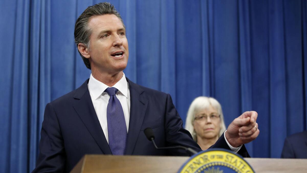 Gov. Gavin Newsom, shown last month in Sacramento, is firing California's top oil and gas regulator over an increase in state permits for hydraulic fracking and allegations of conflict of interest among senior officials.