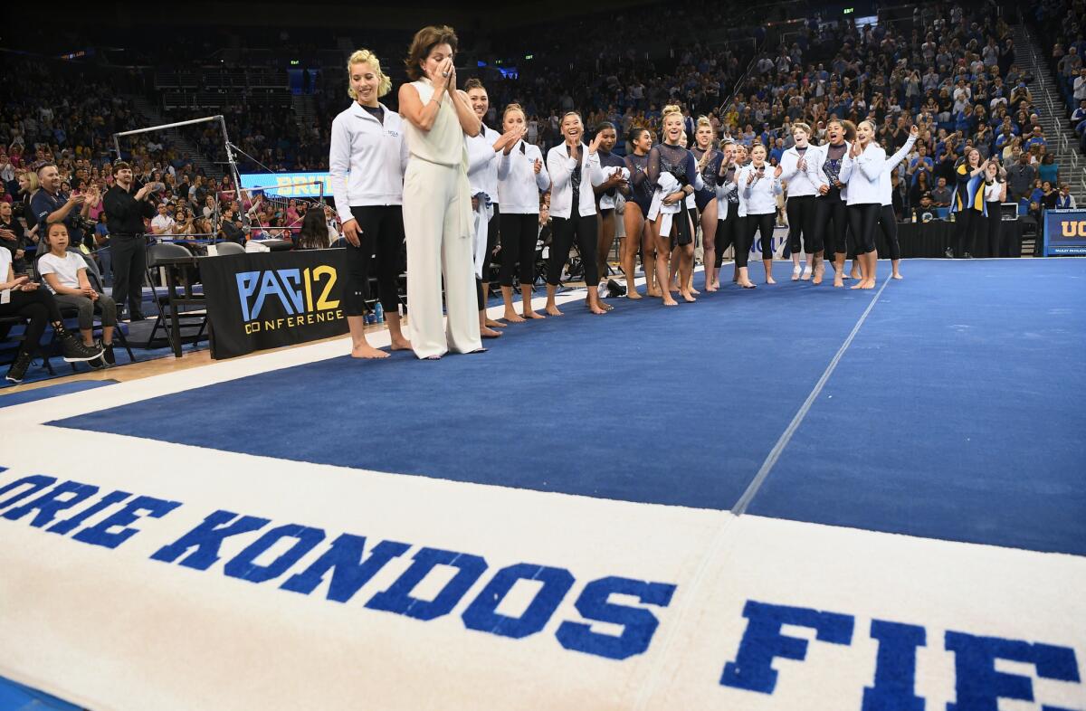 UCLA coach Valorie Kondos Field feels the emotion at the unveiling of a Pauley Pavilion floor named in her honor.